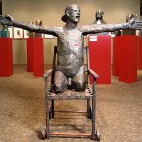 George Wallace - Legless Man on a Chair (second version), 1975, welded steel